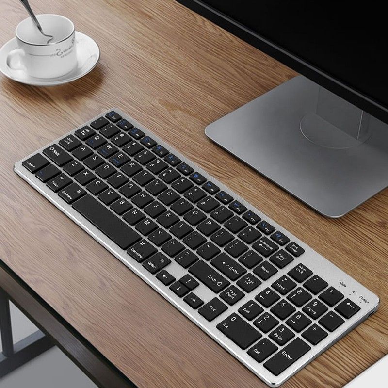 Charging Bluetooth keyboard ultra thin wireless mini iPad tablet mobile phone universal digital charging Bluetooth Keyboard 